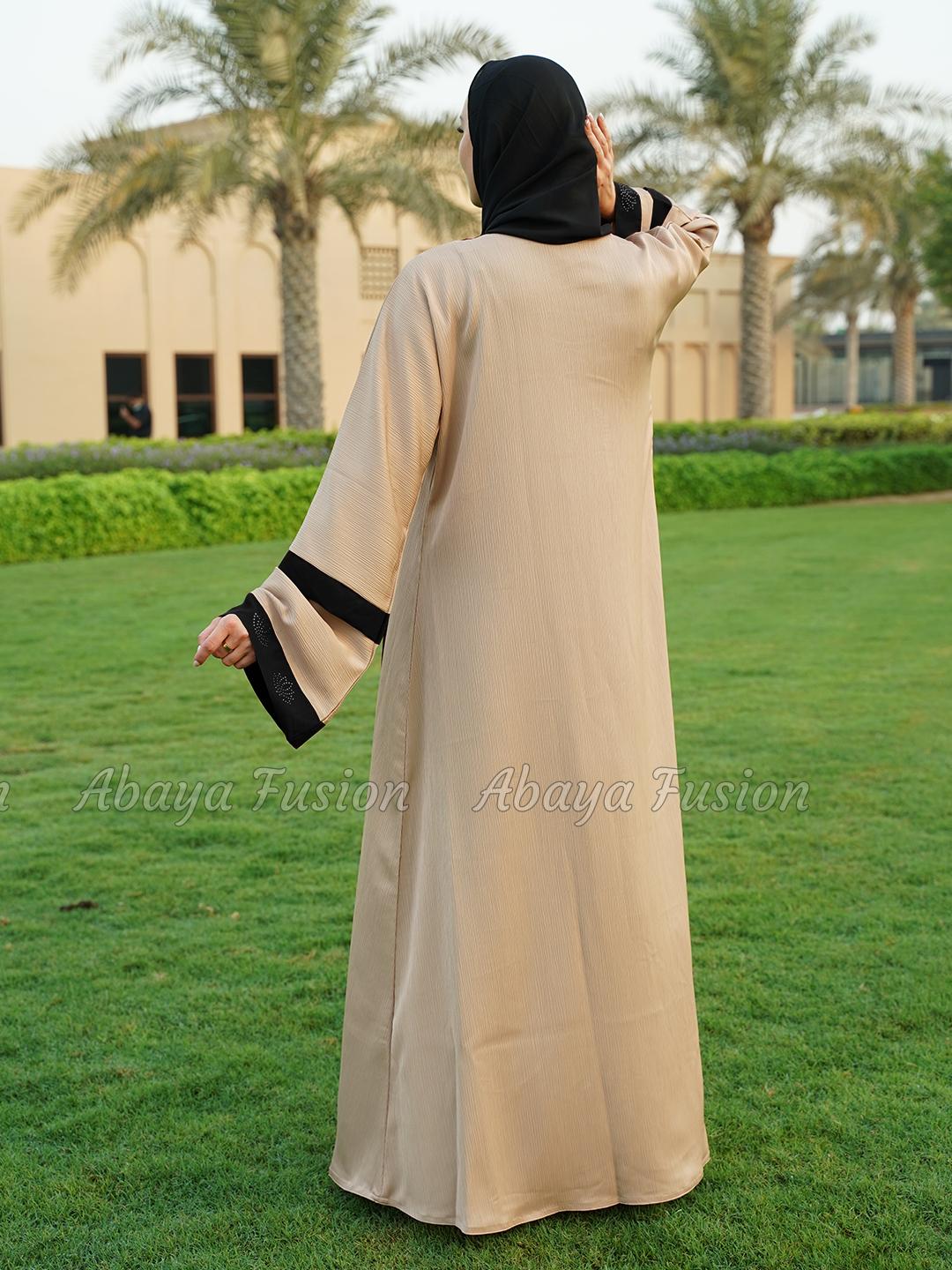 Nida Matte Abaya in black with attached Cream shrug in CEY